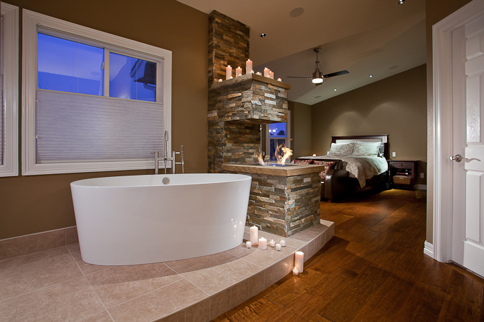 Master suite remodel with fireplace and free standing tub