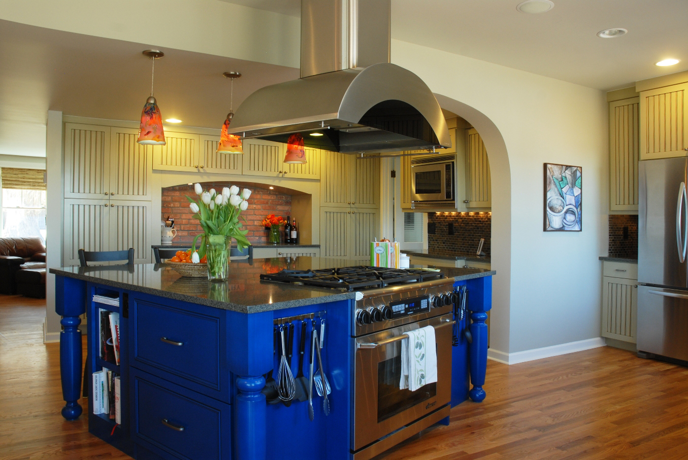 Blue accent island in remodeled kitchen