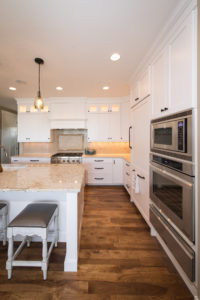 White-cabinets-and-granite-countertops-in-custom-kitchen