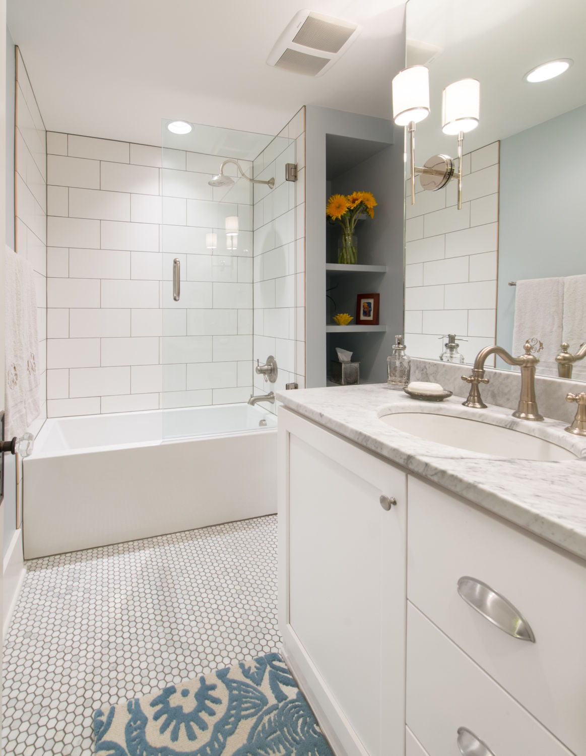 HighCraft-Builders-classic-white-bathroom-remodel-hex-floor-subway-tile-shower-wall-marble-counter