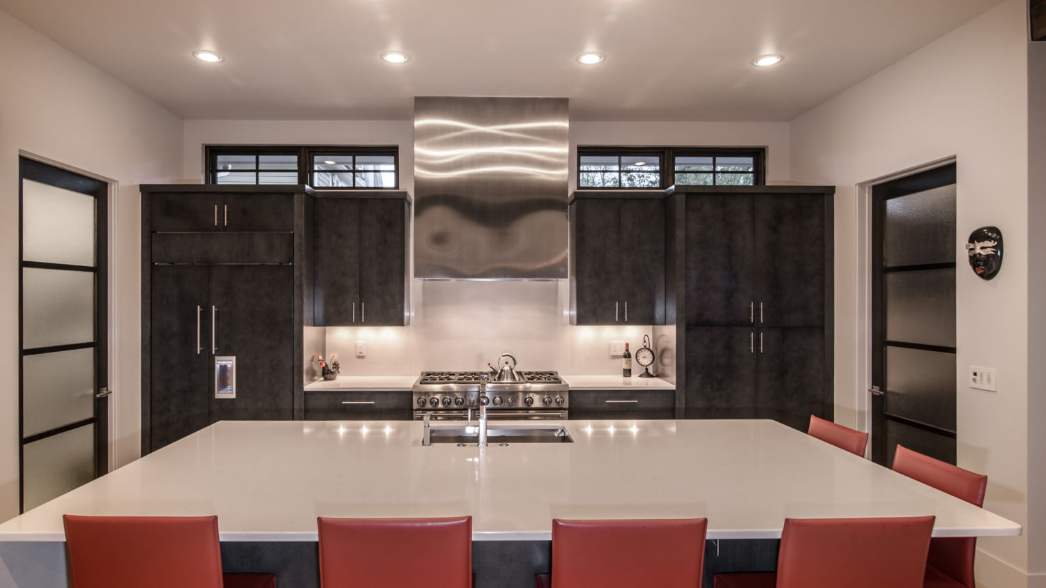 HighCraft-Builders-stylish-kitchen-with-stainless-steel-and-dark-cabinetry