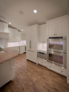 HighCraft-Builders-traditional-kitchen-remodel-with-paneled-fridge-double-oven-and-microwave-drawer