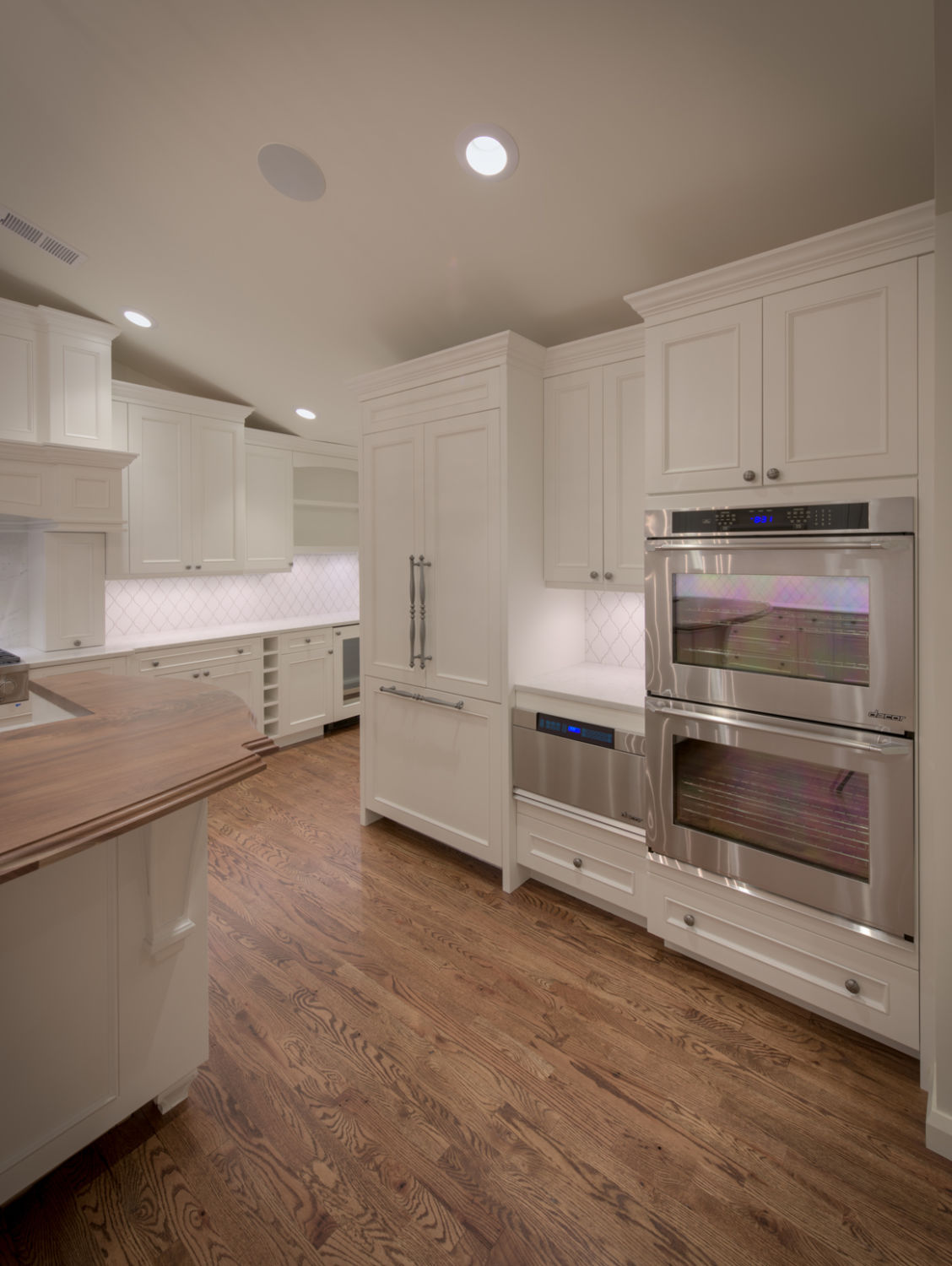HighCraft-Builders-traditional-kitchen-remodel-with-paneled-fridge-double-oven-and-microwave-drawer