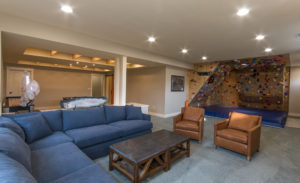 basement-remodel-family-room-climbing-wall