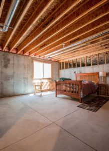 unfinished-basement-bedroom