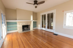 HighCraft Builders Ritter House before photo sunroom brick fireplace remodel