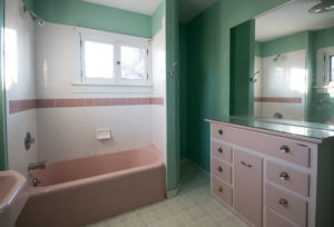 HighCraft Builders pink bathroom before remodel photo
