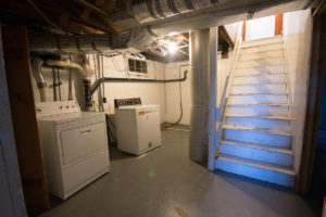 HighCraft Builders dark basement before photo