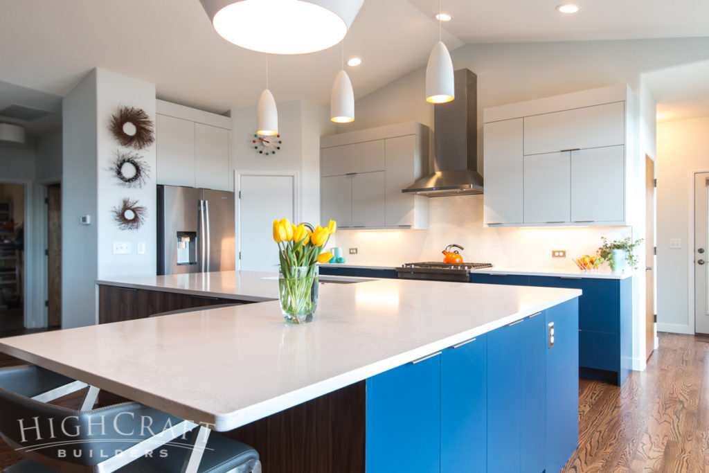 modern blue kitchen quartz L-shaped island