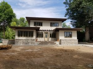 Ritter House remodel front stucco stone facade Aug 2018