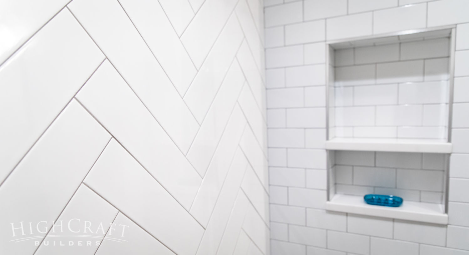 modern rustic basement bathroom shower herringbone tile