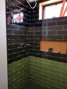 bathroom shower loveland co black green subway tile