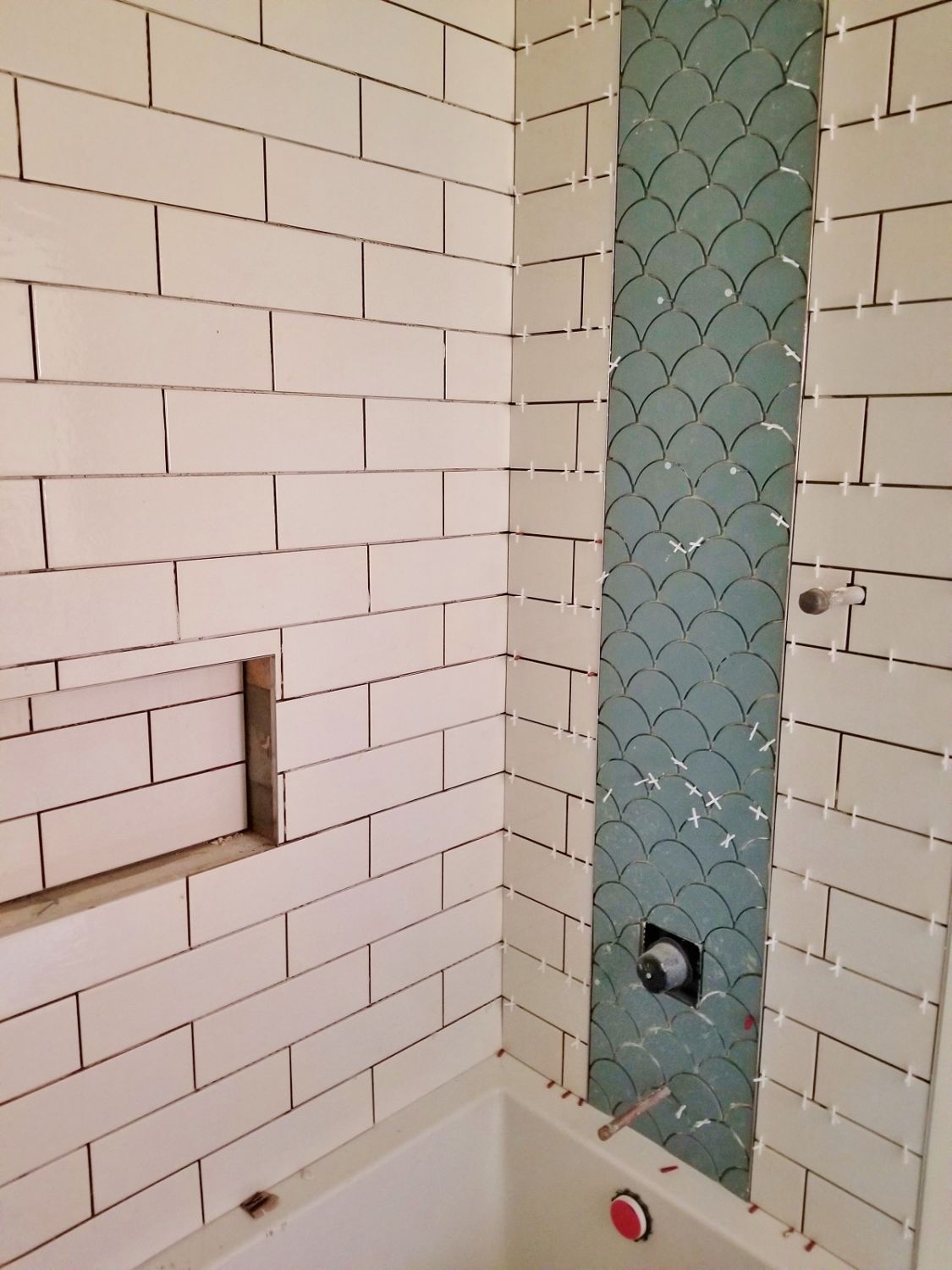 blue scallop bathroom shower tile Loveland new construction