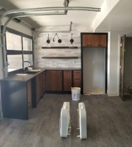 loveland custom new construction basement bar garage doors June 2019