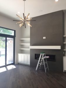 loveland new construction living room fireplace sputnik light fixture June 2019