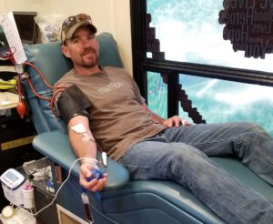 Scott giving blood_highcraft builders community outreach