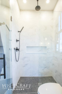Open-concept-farmhouse-shower-marble-penny-tile