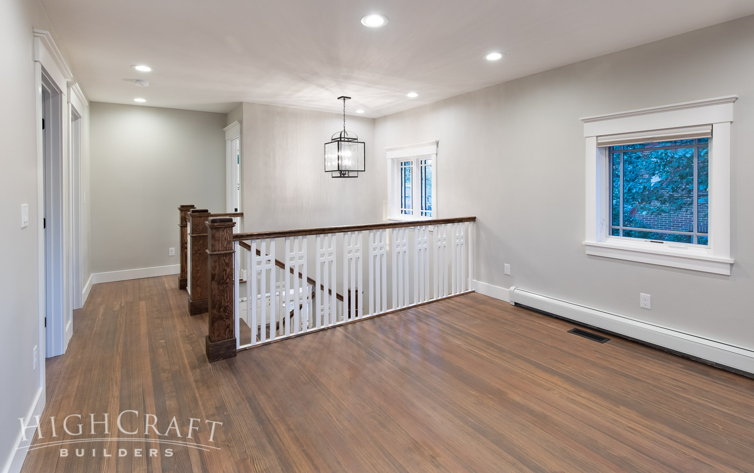 Prairie-style-historic-home-stairs-handrail-oak-flooring