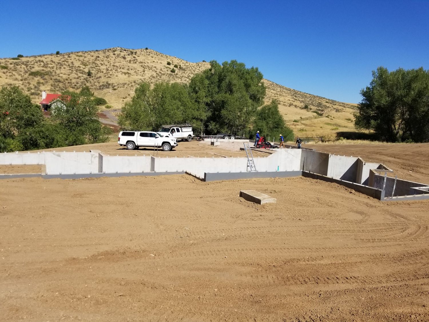 custom house builder northern colorado foundation dirt backfilled