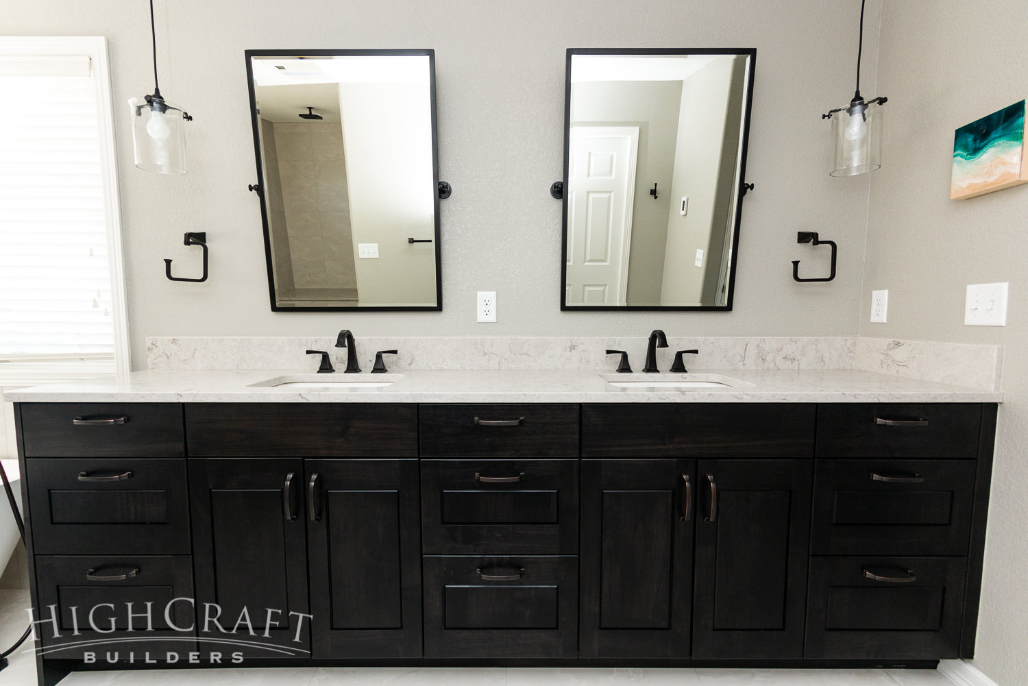 Elegant-bath-modern-black-cabinets-mirrors