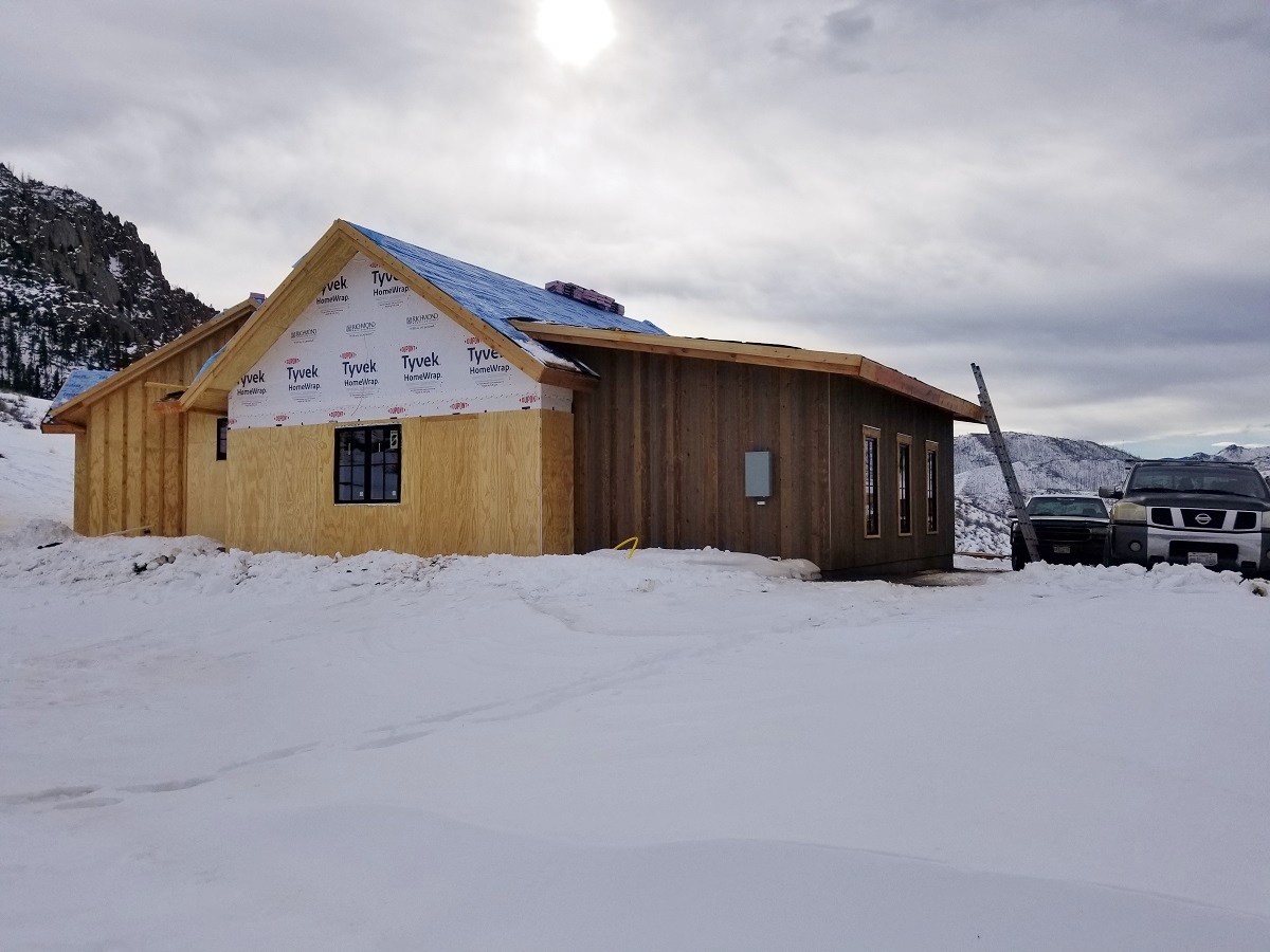 mountain custom home builder exterior siding snow December 2019