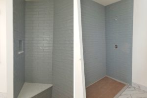 mountain_custom_home_building_bathroom_shower_gray_tile_corner_bench_two_pics