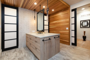 athroom_and_remodeling_textured_melamine_vanity_back_to_back_sinks_commodes_shared_mirror_shoji_doors_tongue_and_groove_cedar