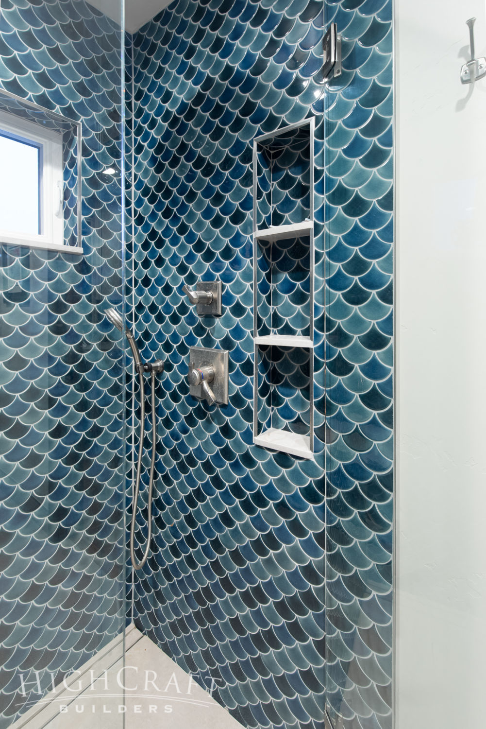 custom_house_builder_contractor_companies_master_bath_shower_mermaid_tile_blue_glass_door