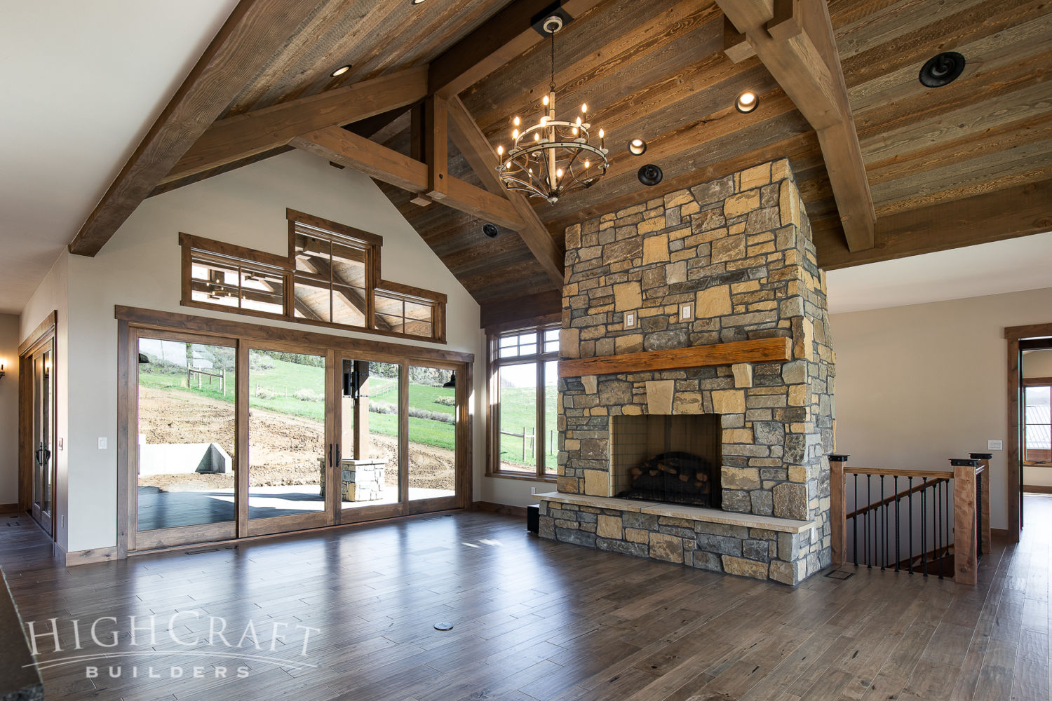 contractor_companies_near_me_lodge_room_fireplace_ceiling_beams