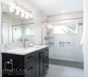 bathroom_and_remodeling_fort_collins_co_glass_shower_quartz_countertop_glass_shower_walls