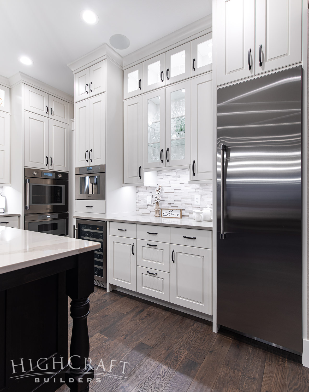 custom_home_builder_colorado_white_kitchen_beverage_cooler_and_refrigerator