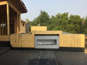 custom_home_builder_fort_collins_co_outdoor_fireplace_in_progress