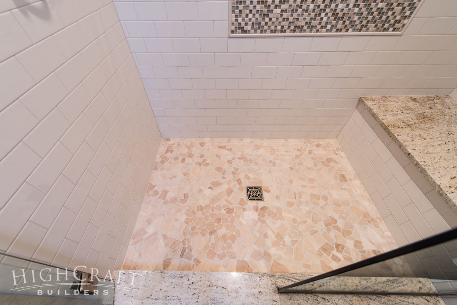 Lakeside-Craftsman-Remodel-pebble-tile-shower-floor