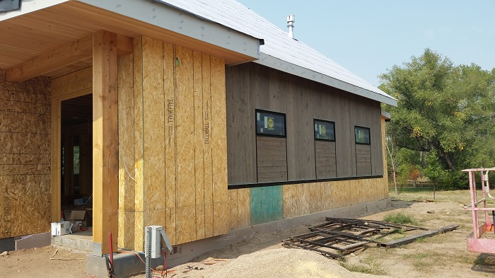 custom_home_build_progress_exterior_east_side_garage_siding