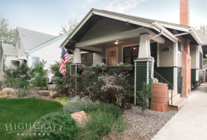 craftsman_bungalow_exterior_renovation_fort_collins_co_two_tone_green_american_flag_driveway