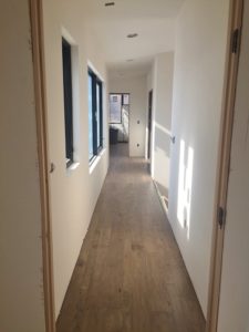 new_custom_home_construction_near_me_hallway_progress_drywall