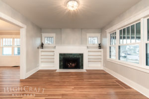 whole_house_remodel_living_room_gas_fireplace_built-ins_refinished_wood_flooring