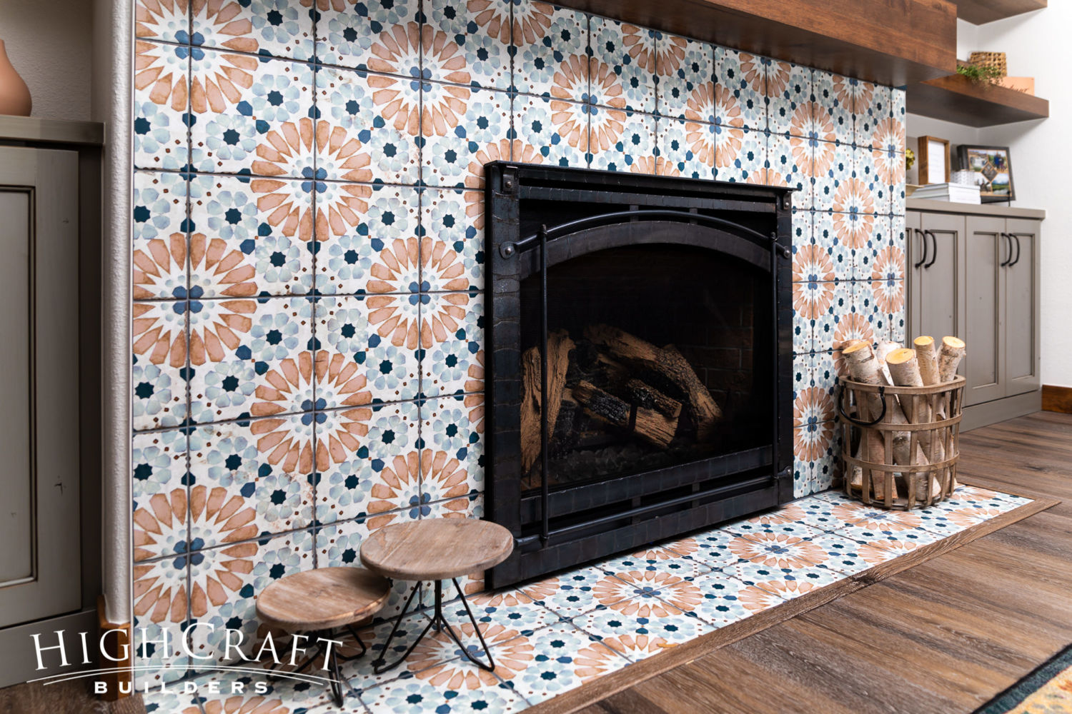 basement-finish-floral-pattern-tile-fireplace-surround