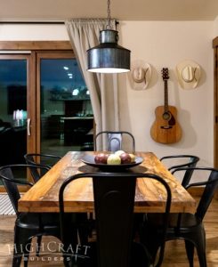 over_garage_apartment_dining_room_table_guitar_wall