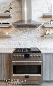 colorado-contemporary-kitchen-remodel-gas-range-stainless-hood