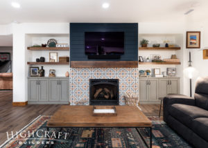 basement-remodeling-contractor-great-room-living-room-fireplace-blue-shiplap-accent-wall