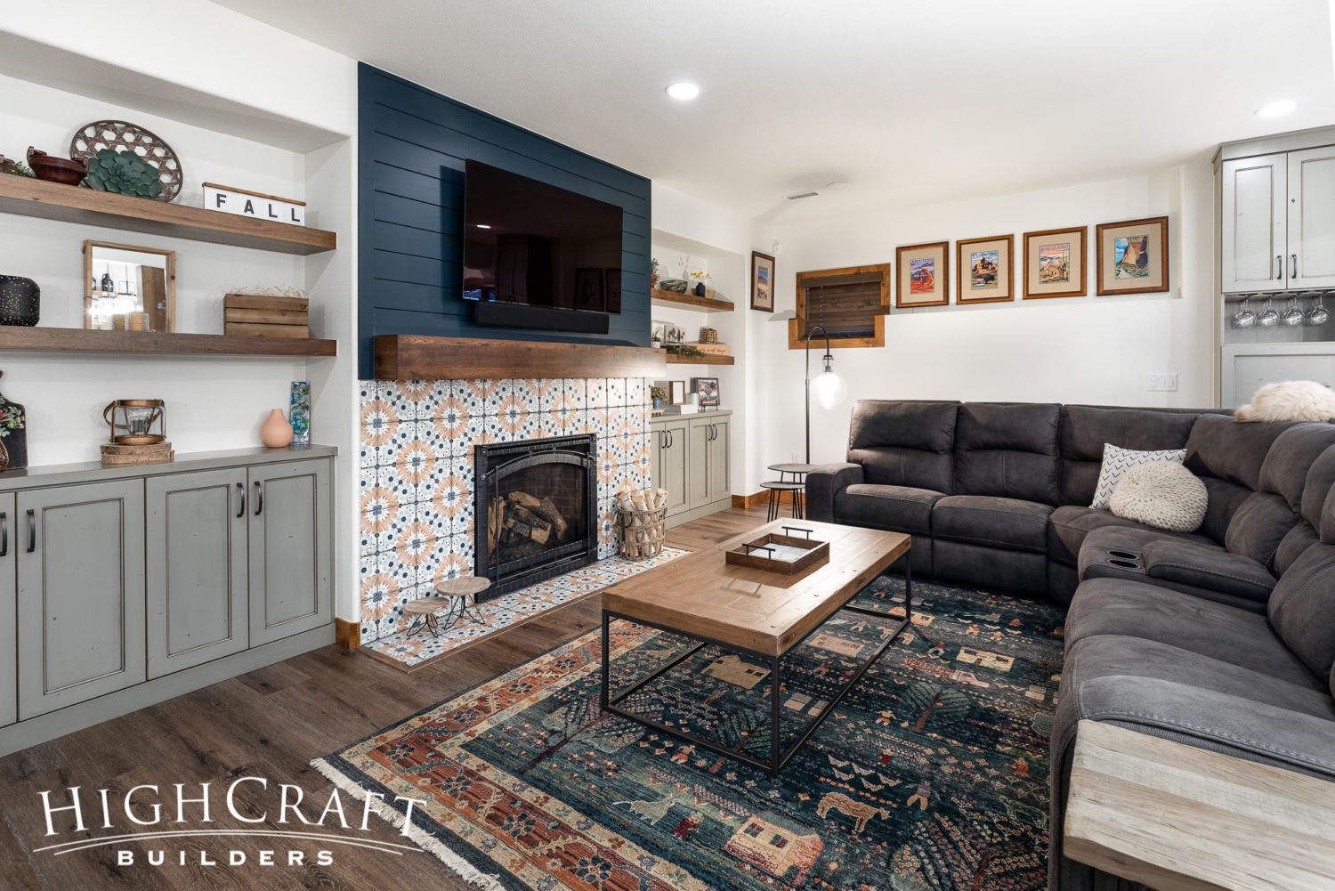 basement-remodeling-contractor-great-room-living-room-fireplace-shelving-built-in-cabinets