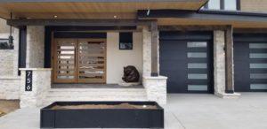 custom-home-construction-fort-collins-co-contemporary-front-door-garage-doors
