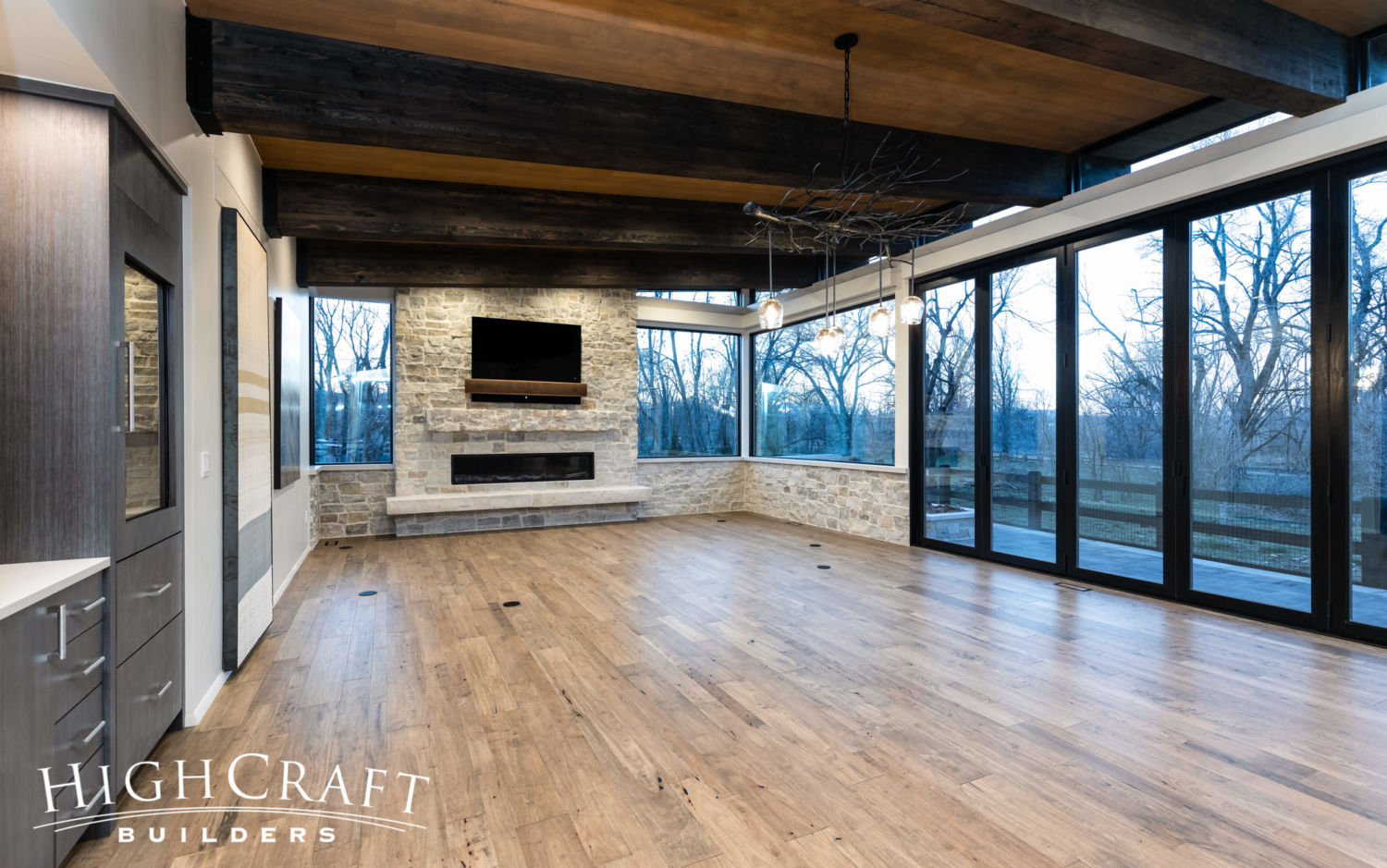 contemporary-custom-home-builder-living-room-fireplace-wet-bar