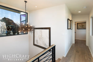 contemporary-custom-home-builder-second-floor-stair-landing-light