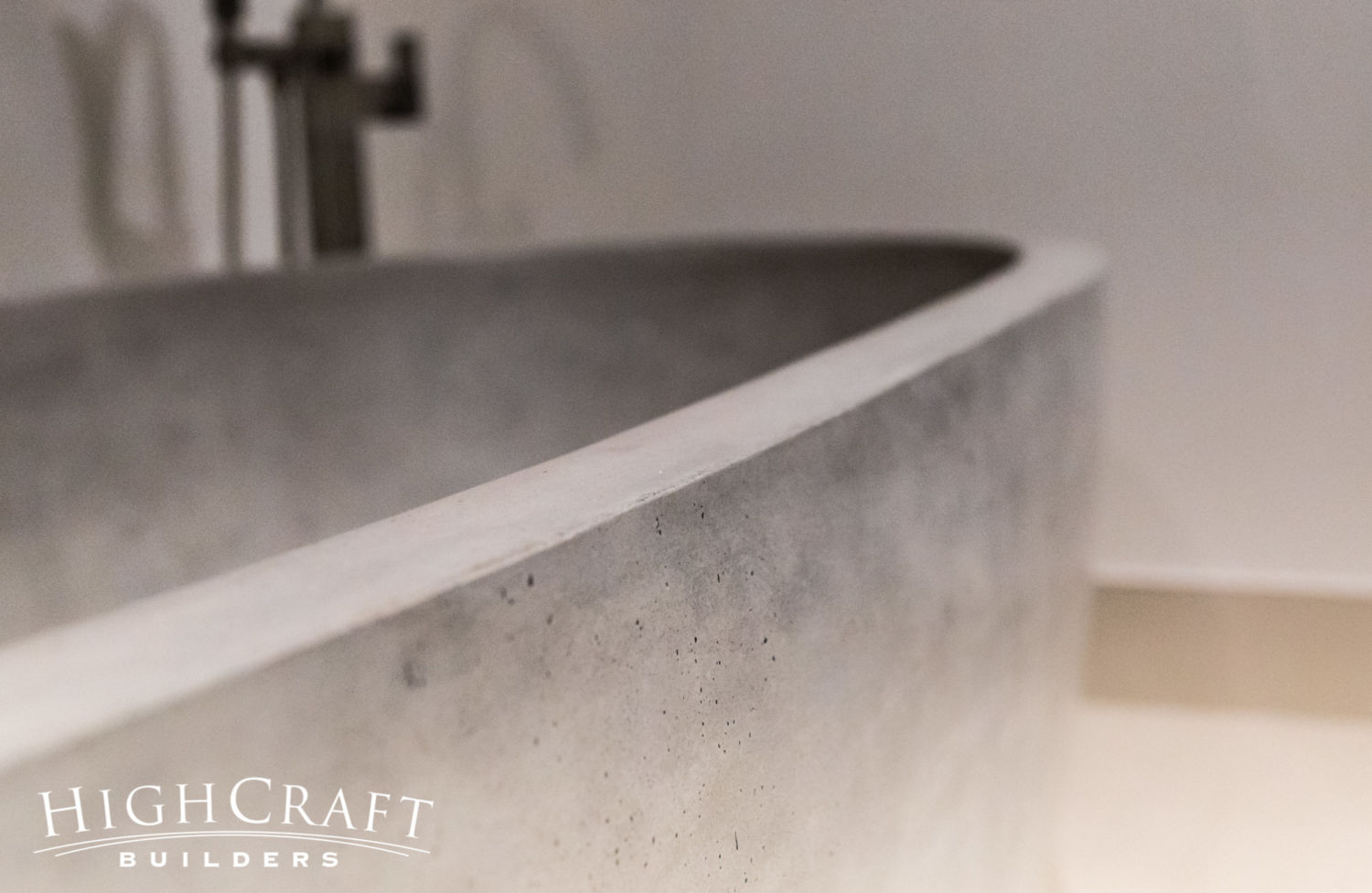 contemporary-custom-home-master-bath-concrete-tub-closeup