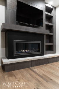 contemporary-custom-home-sitting-room-fireplace-surround