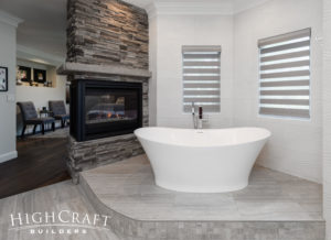 bathroom-remodeling-fort-collins-co-stand-alone-white-tub-fireplace