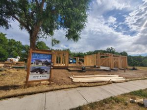 custom_home_construction_fort_collins_co_early_framing_highcraft_builders_sign