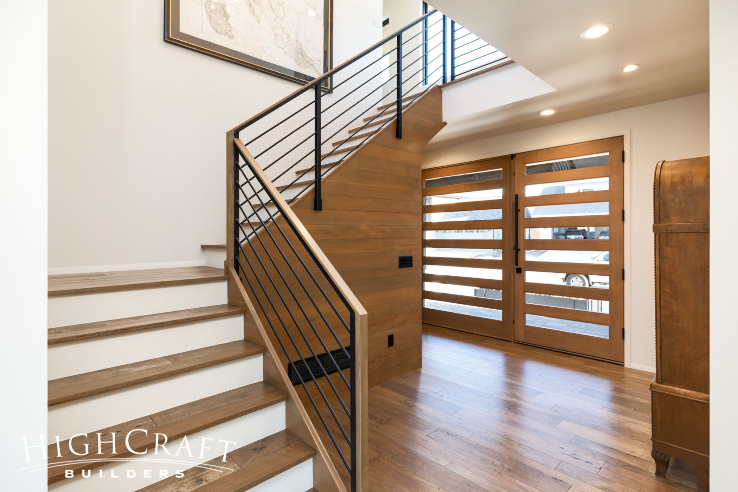 Soft-Contemporary-Custom-foyer-stairs-railing